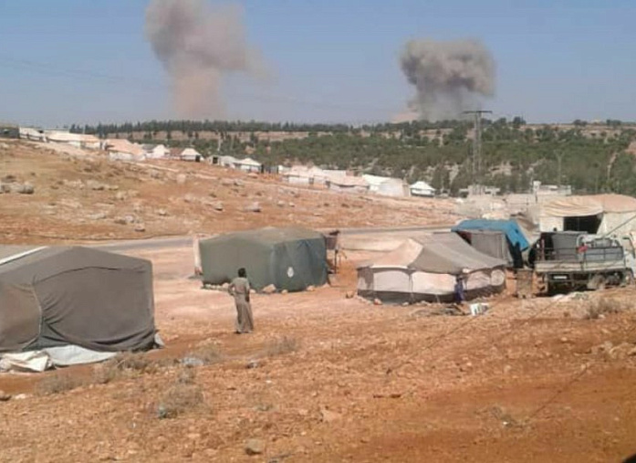 俄罗斯空军空袭叙利亚境内恐怖分子装甲车基地