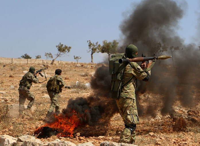 Syrian troops are clashing violently with militants in the south of Idlib